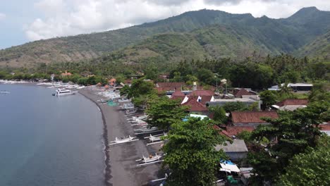 aerial drone view above seaside of amed village, bali indonesia