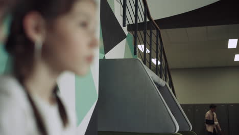 active kids have fun on school break. serious brunette girl and boy close up.