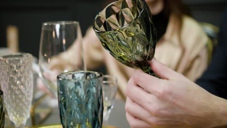 hands holding crystal glasses