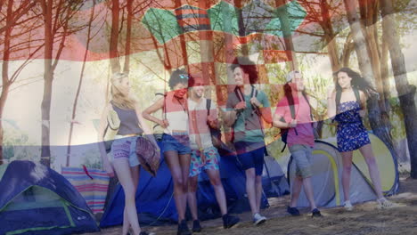 group of friends camping with croatian flag animation over forest background