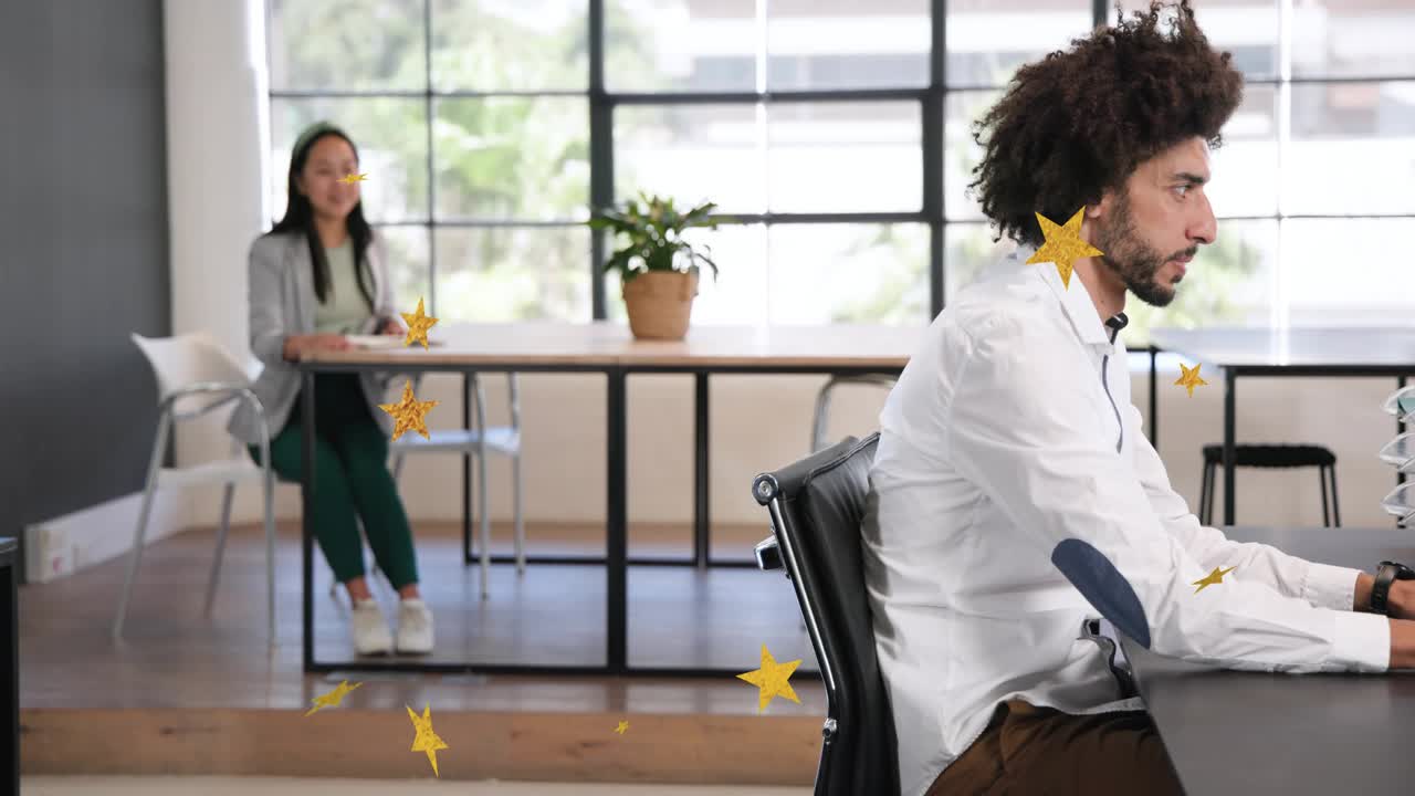 Cam panning, man typing on laptop, caption overlay appearing bottom third, dimming bg for business