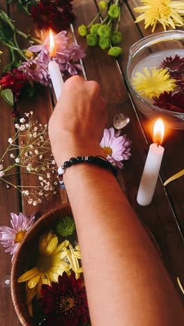 spiritual ritual with candles and flowers