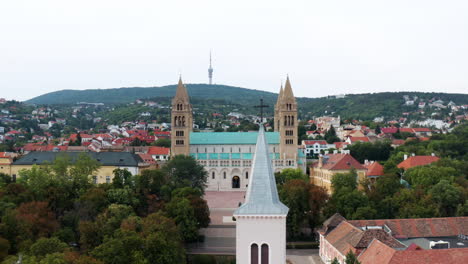 Aerial-View-Of-Pecs-Cathedral-At-Sunset-In-Hungary---drone-shot