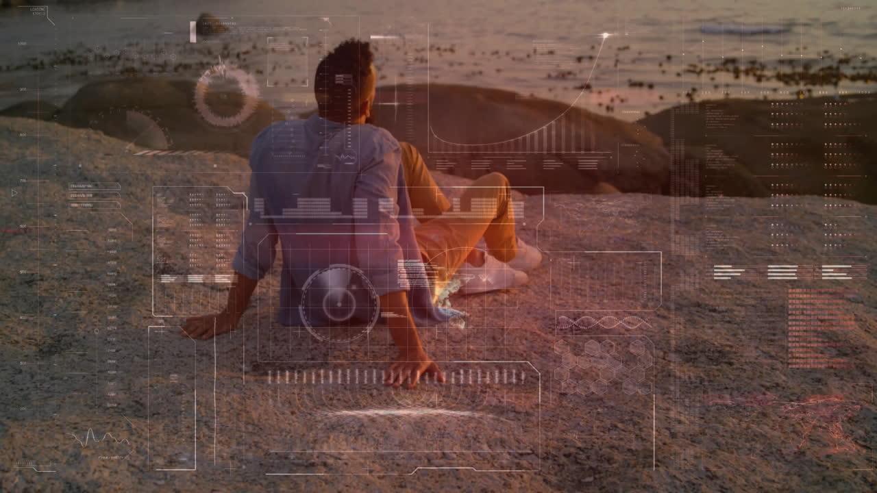 Man sitting on rocky shore with digital interface animation overlay