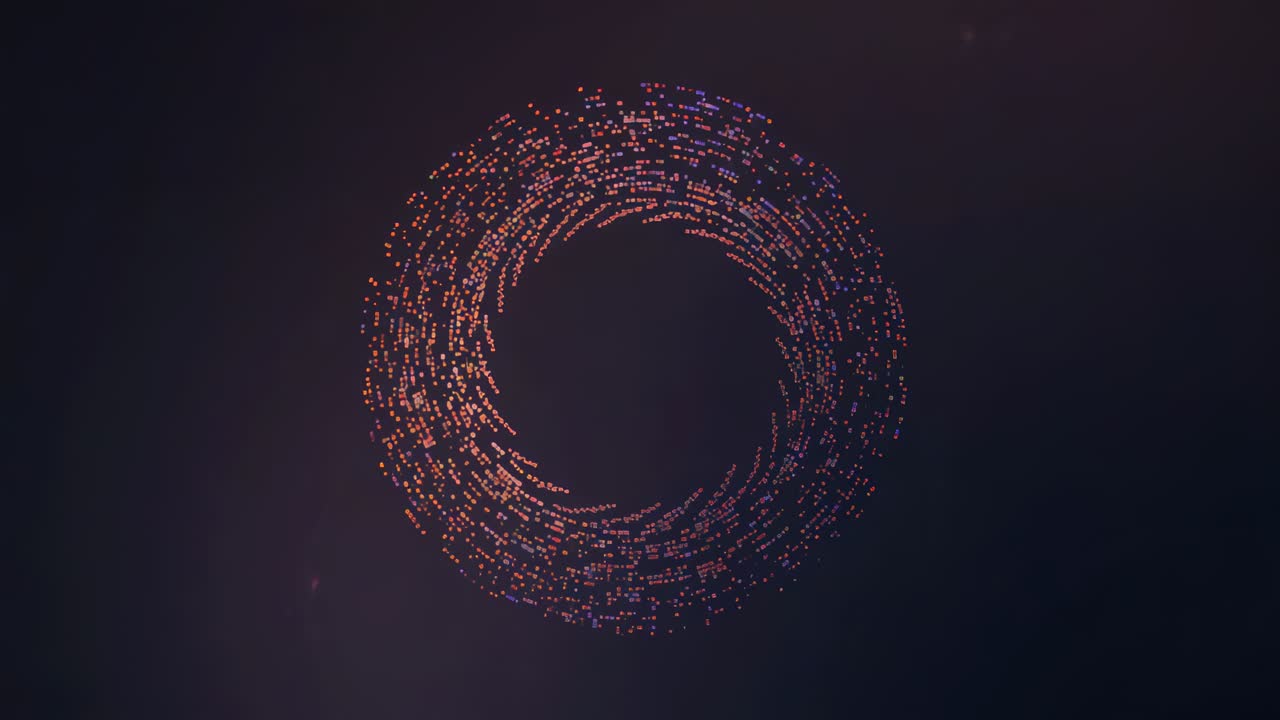 Starting animation showing central glowing pixel ring thickening in studio backdrop with warm flare