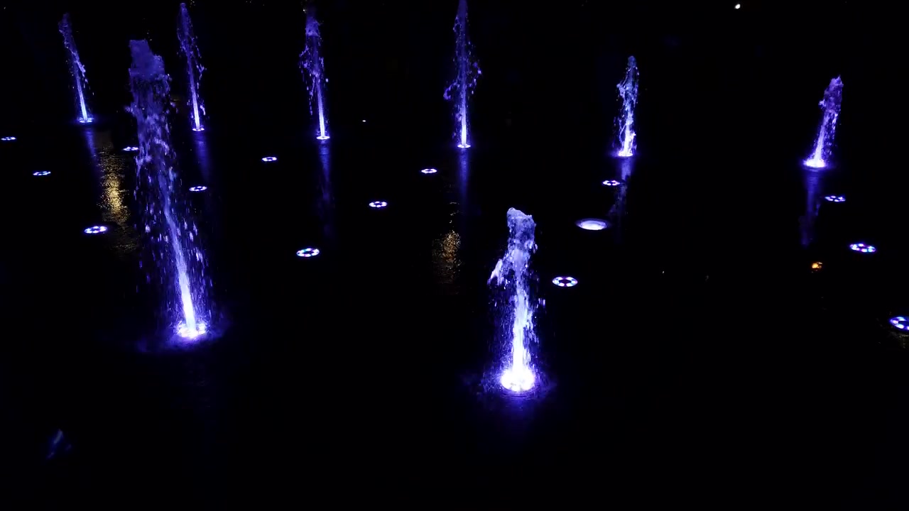 Fountain jets on the city boulevard.