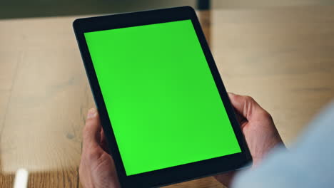 Closeup-mockup-computer-boss-arms-holding-at-office.-Man-watching-green-screen