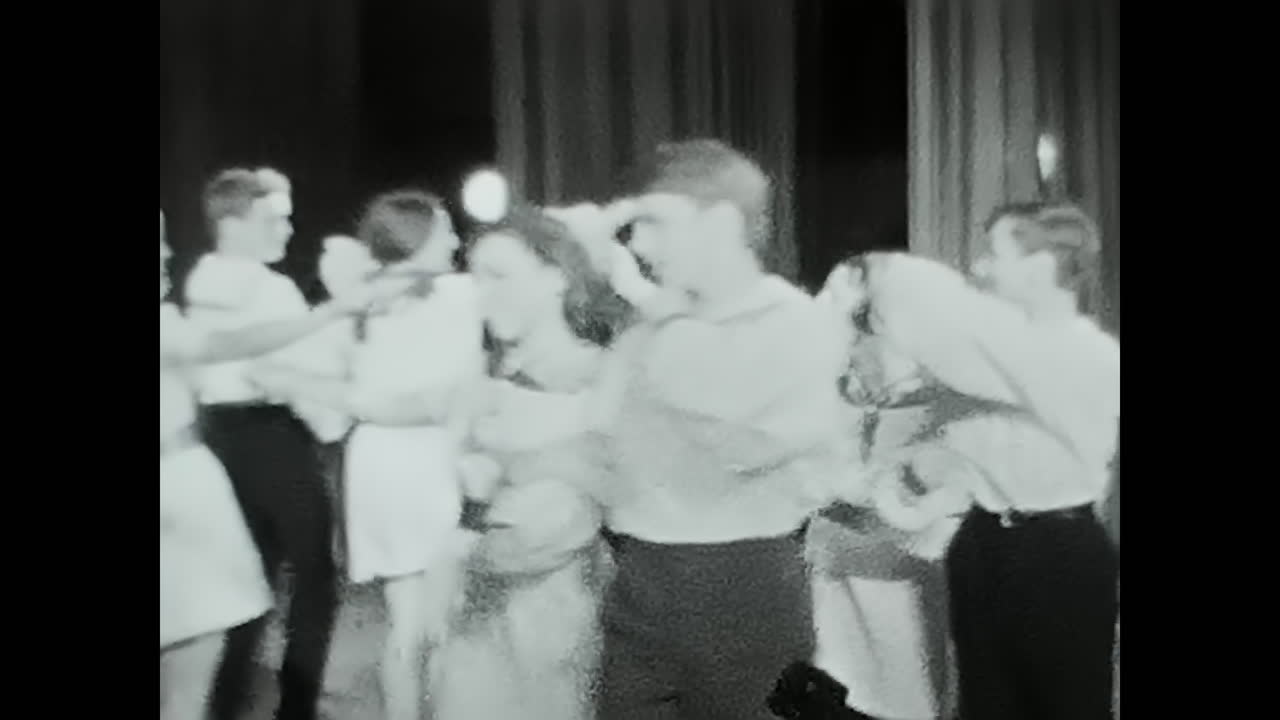 Group of People Dancing in Black and White. CIRCA USSR 1970: Group of People Dancing in Black and White