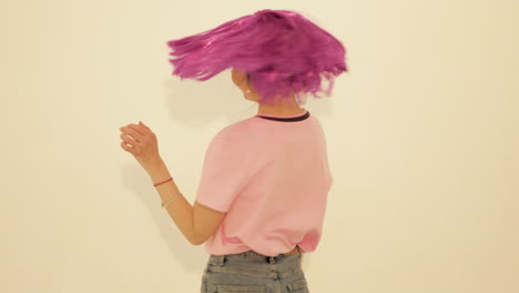 woman with pink wig dancing