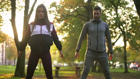 couple exercising in the park