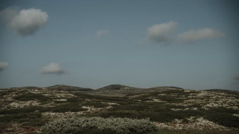 Beautiful-summer-clouds-growing-and-disappearing-in-mountain-area