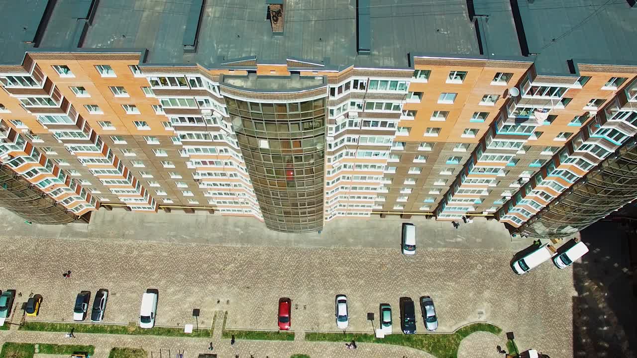 Facade of multi storey building. Aerial view of residential complex of modern construction