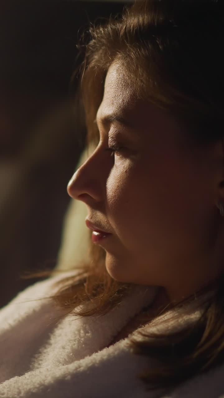 Woman depressed by sad thoughts resting alone in hotel room. Negative thinking and depressive phase in adulthood. Mental problems after difficult divorce