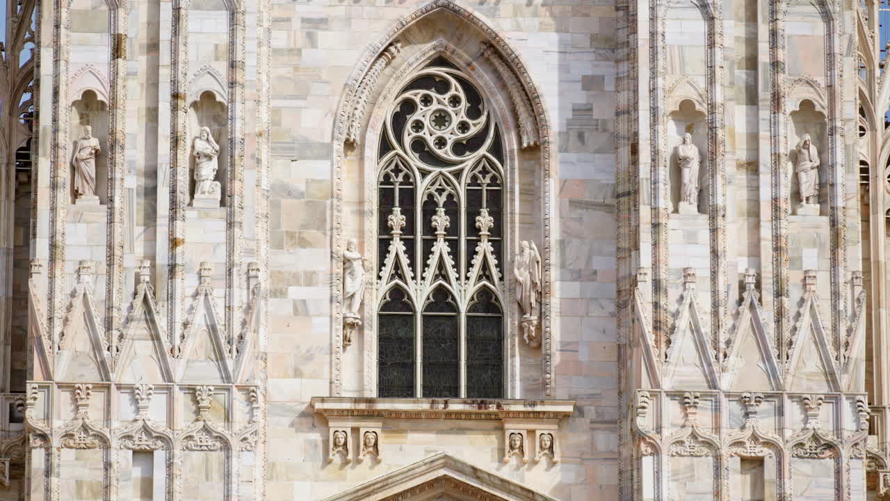 View of the Milan Cathedral in Italy over a cloudy sky in daylight