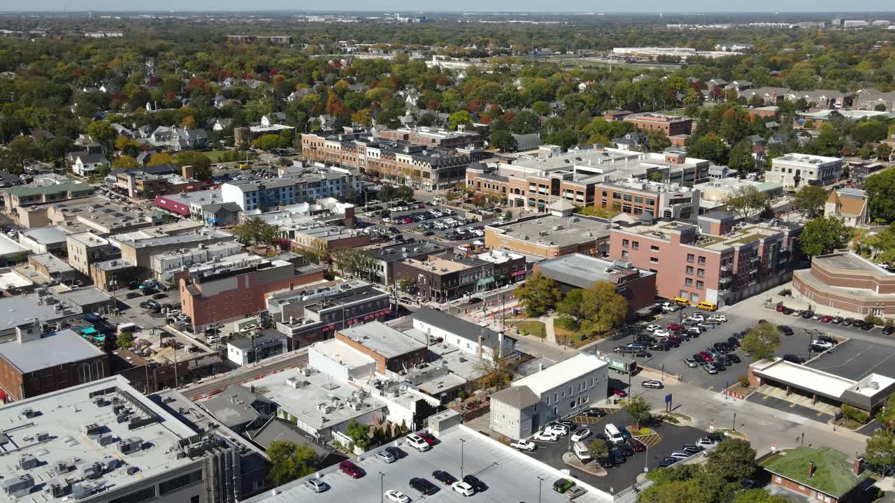 Naperville, IL, a Chicago suburb, on a sunny fall day, featuring buildings, streets. Zoom Day NW