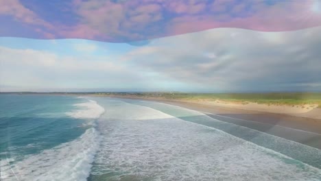 animation of flag of netherlands blowing over beach landscape