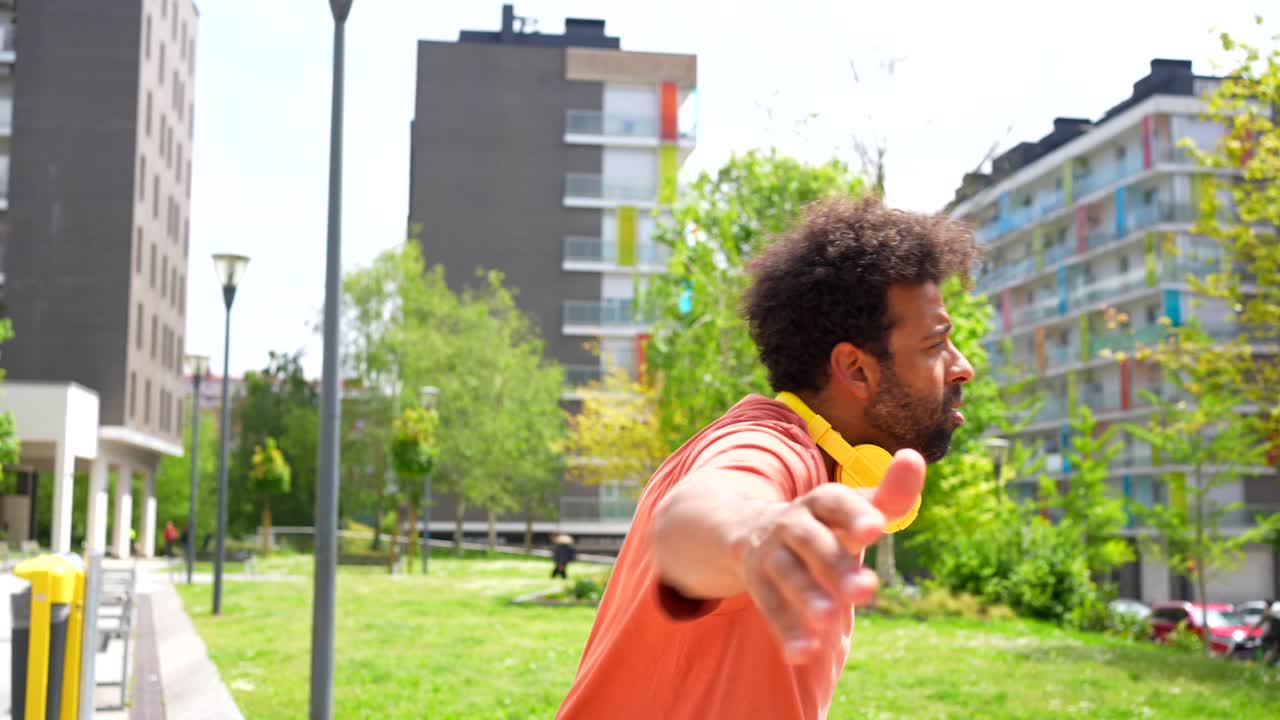 Man dancing in an urban park