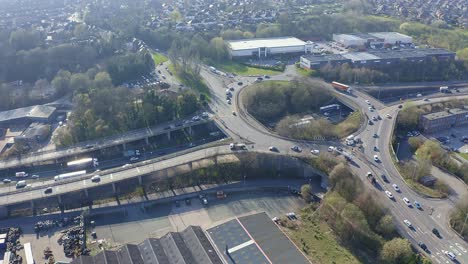 Aerial-footage-of-a-large-section-of-commuter-motorway,-highway,-during-busy-congestion,-traffic,-rush-hour