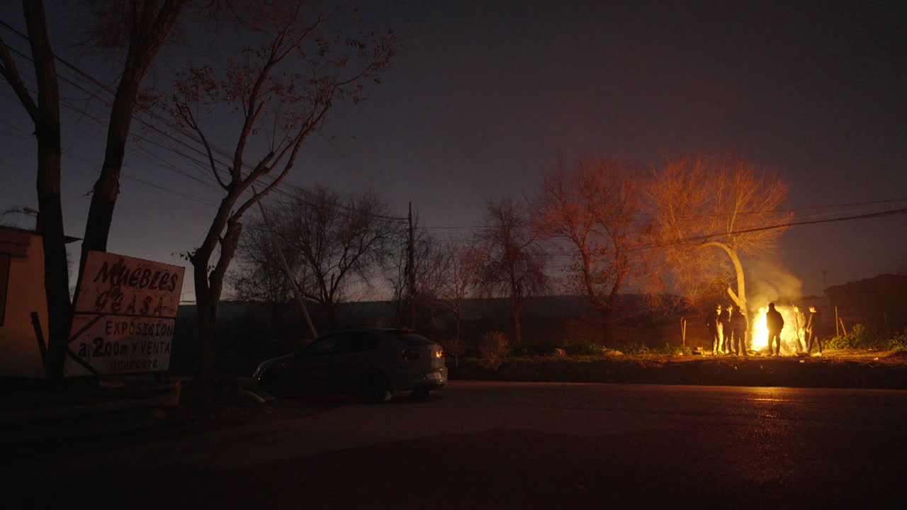 Night gathering around a campfire