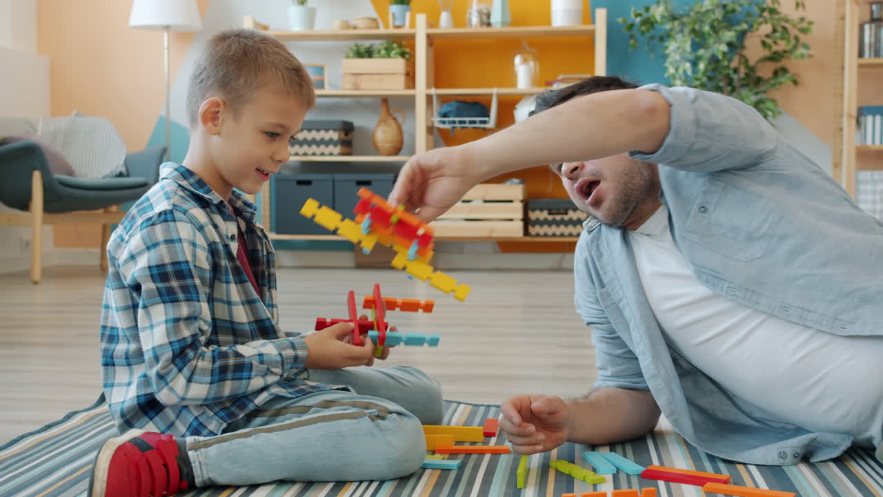 Father and Son Playing with Building Blocks