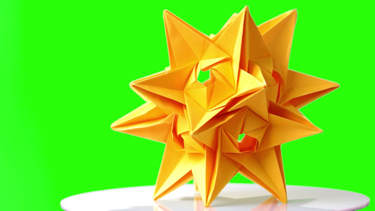 el modelo de origami en pantalla verde.