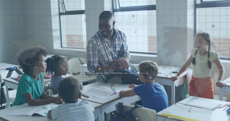Teacher lifting globe rotating it as students leaning in asking geography questions during class