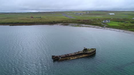 slow motion, wreck of juniata, an old abandoned ship at inganess bay on the mainland of orkney, scotland