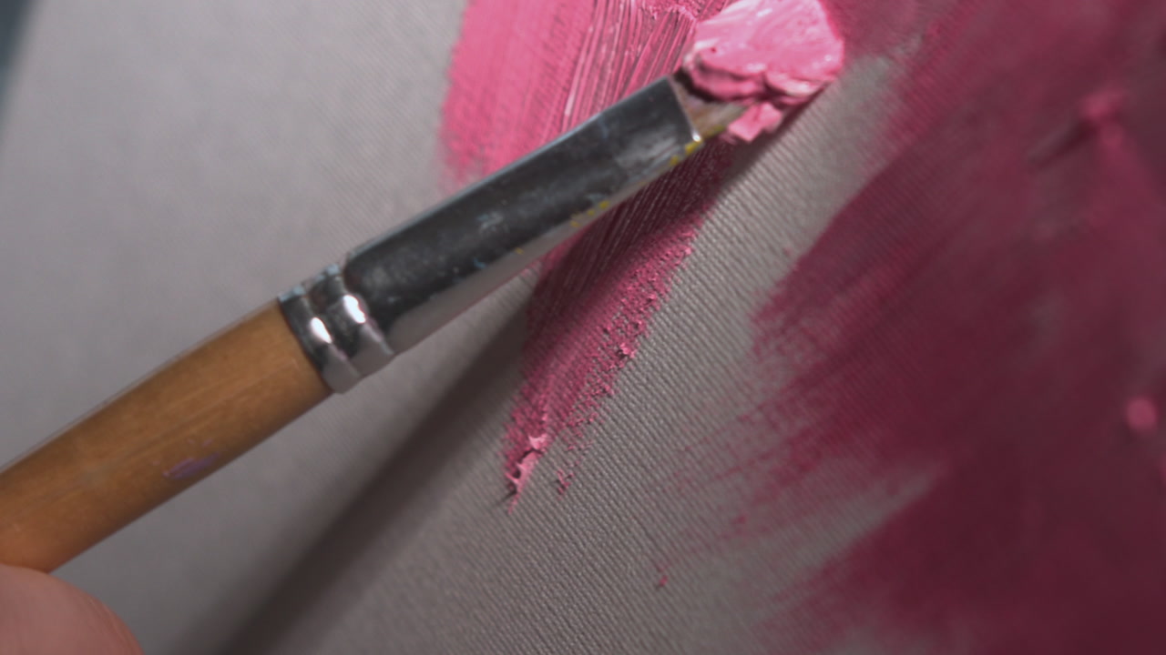 Thick Impasto Pink Paint Application Showing Tactile Strokes And Rich Pigment Hand Loads Brush And Presses . Media