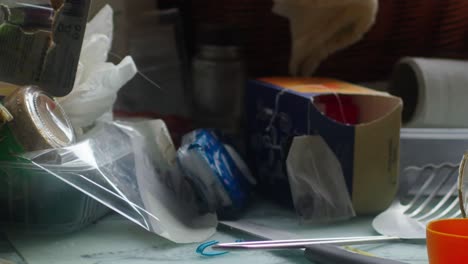 the camera slowly reveals the mess on the kitchen counter