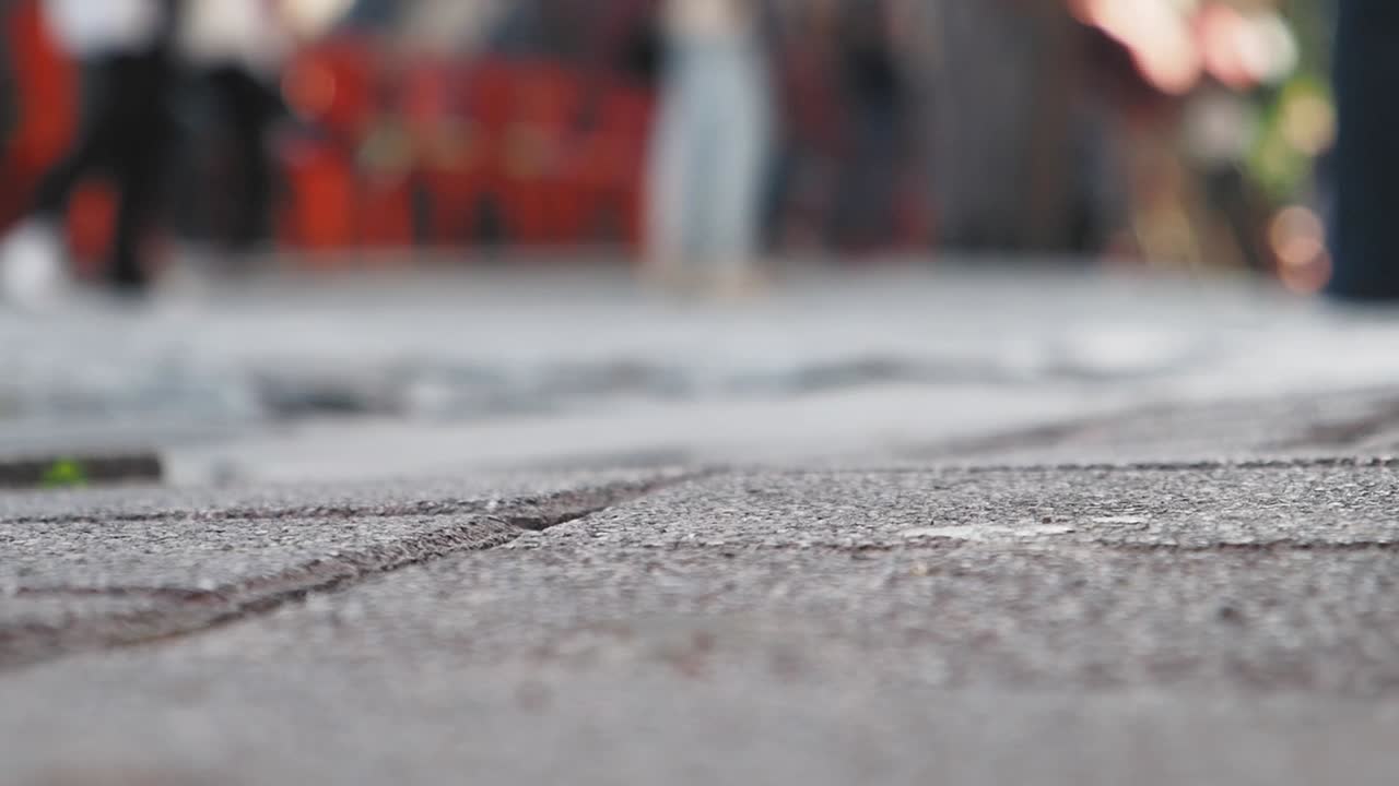 Blurred City Street Scene with People