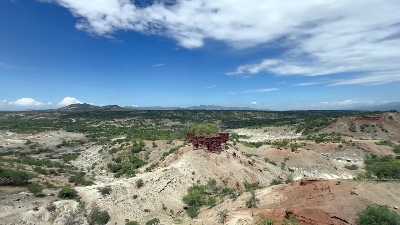 Olduvai Gorge or Oldupai Gorge panorama on a sunny day in Ngorongoro Conservation Area in Tanzania.