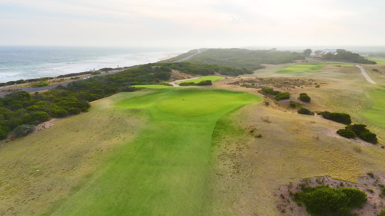 Drone footage captures the scenic Barwon Heads golf course and coastline under soft, natural lighting with sweeping camera movements