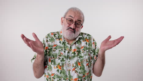 man shrugging in hawaiian shirt
