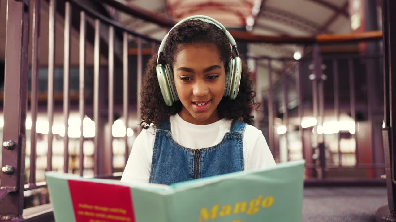Girl Reading with Headphones