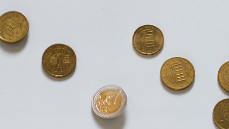 euro coins falling on the ground - slow motion