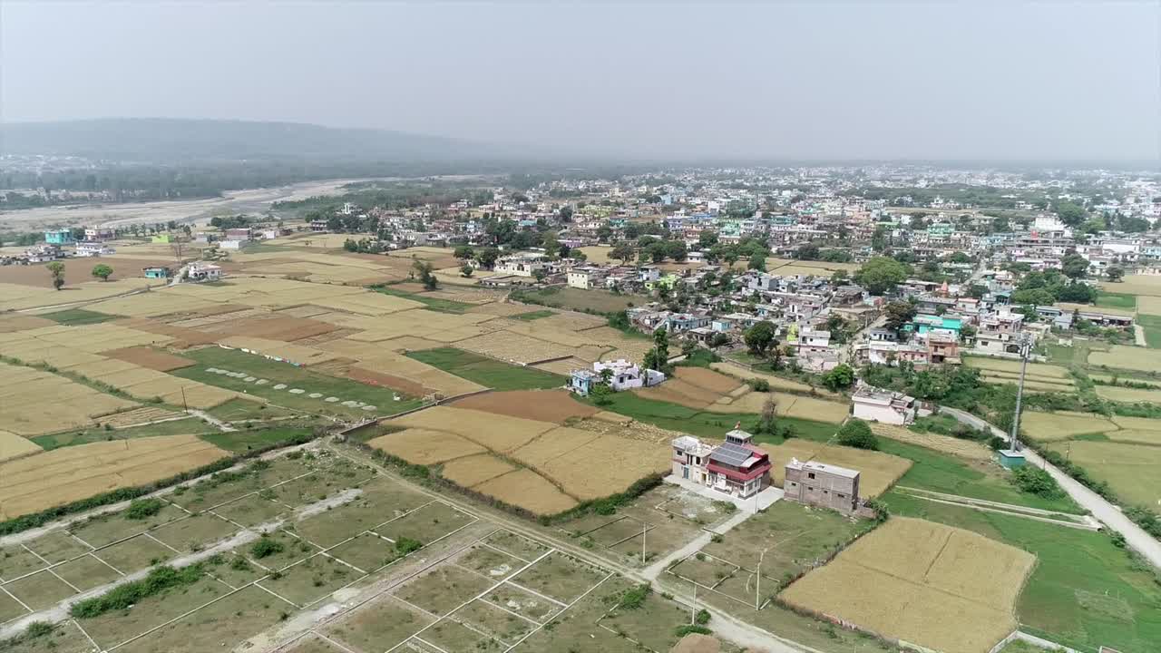 Aerial View of Rural Village and Farmland