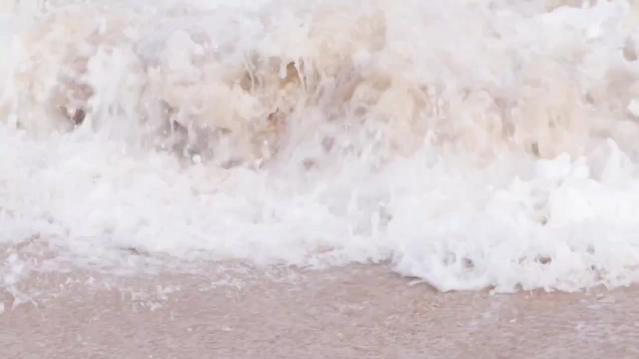 camera movement starting behind the beach rocks and ends also behind the rock jungle beach b roll footage slow motion