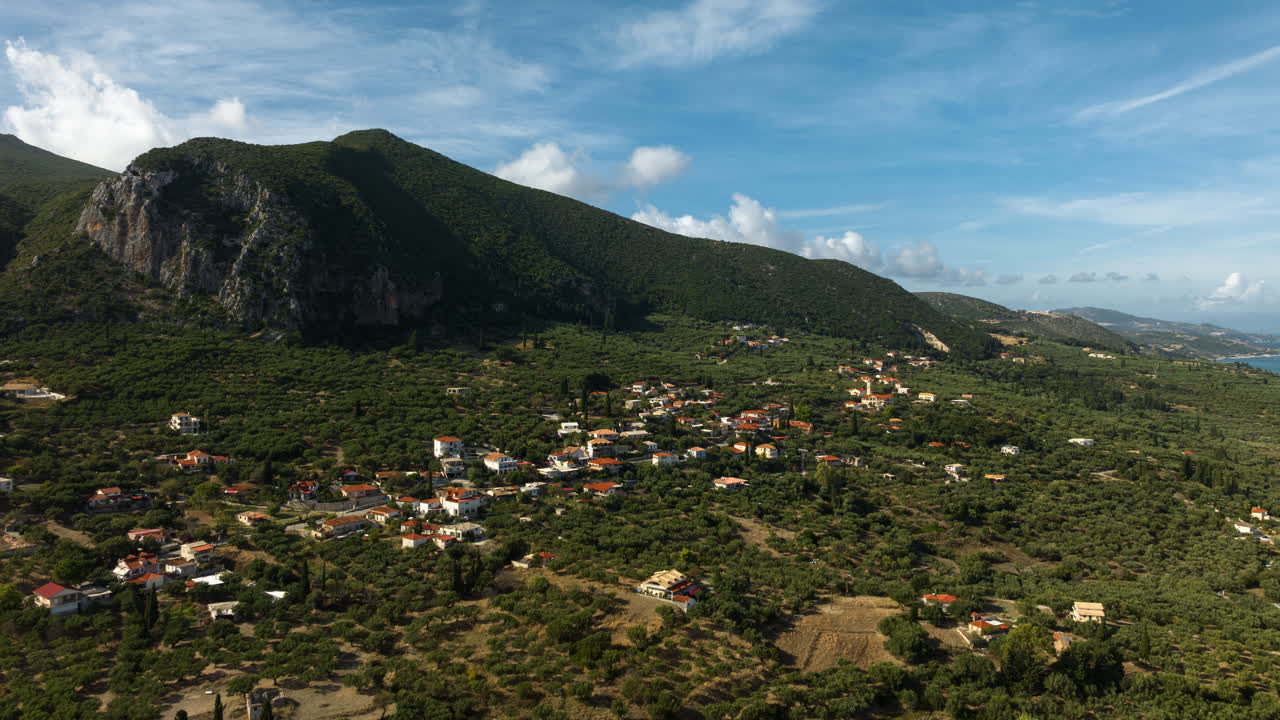 Aerial view of a Greek village nestled in the mountains