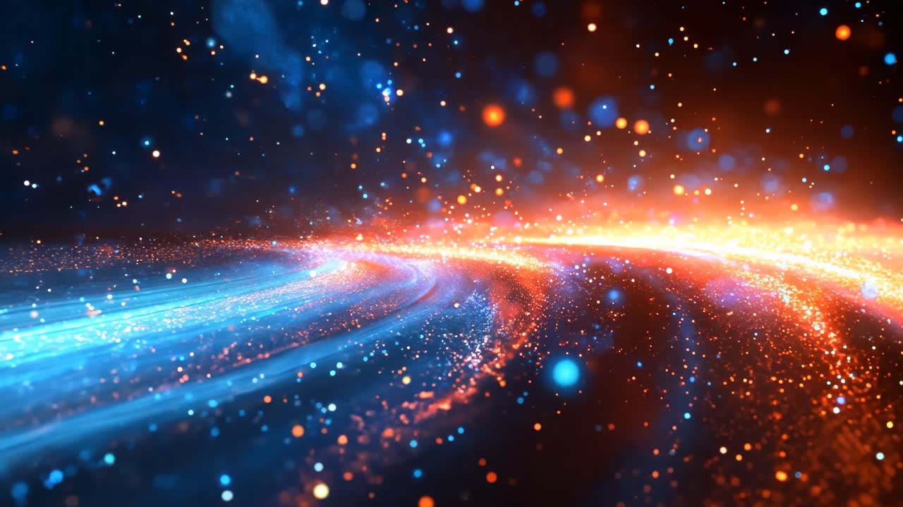 A bright blue and orange galaxy with a lot of stars. The stars are scattered all over the galaxy and the colors are very vivid