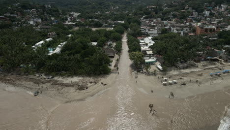 Aerial-View-Of-Sayulita-Beach-And-River---Aftermath-of-Hurricane-Roslyn-In-Sayulita,-Mexico