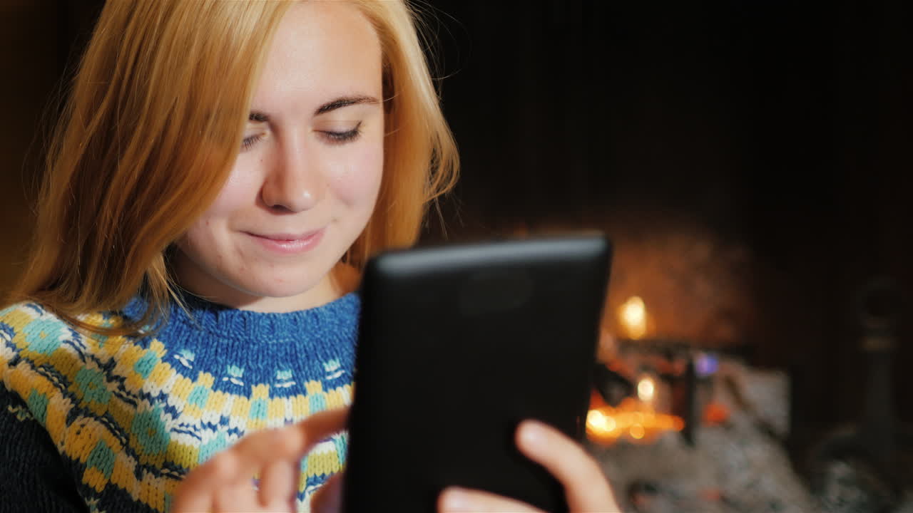 Portrait Of A Young Caucasian Woman With The Tablet