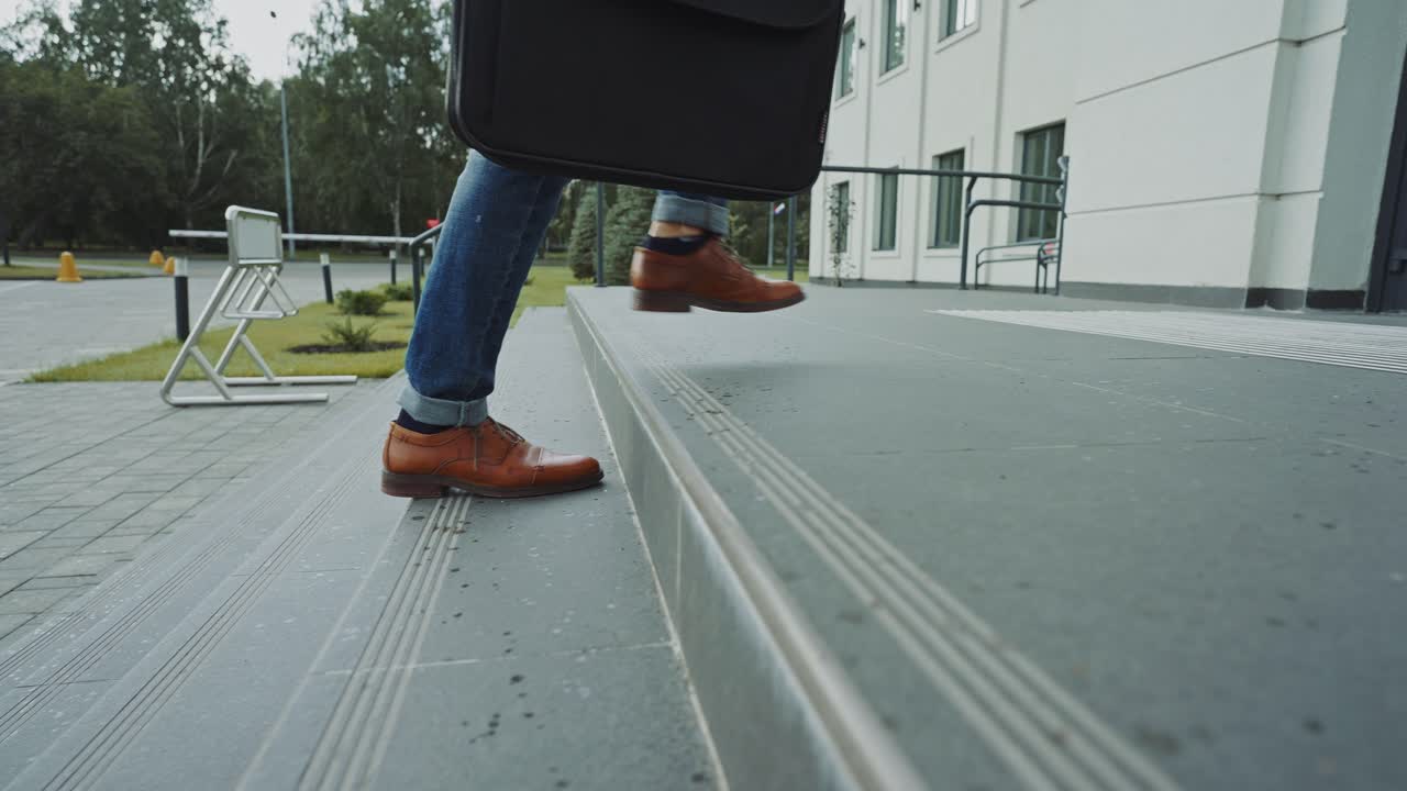 Business Person Walking up Stairs