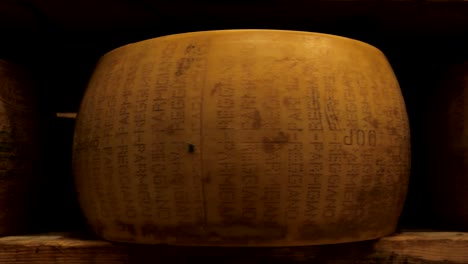 parmesan lying, ripening on the shelf