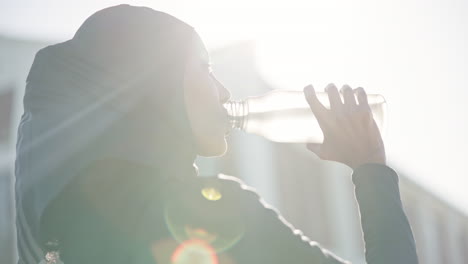 moslem woman, drinking water