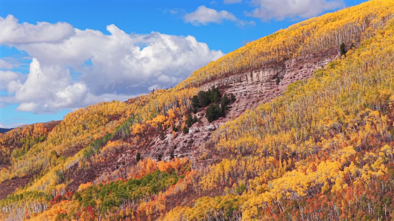 Vail Valley Vail Village Avon Beaver Creek Vail Pass aerial drone Colorado fall autumn Rocky Mountains hillside cliffs quaking Aspen Trees morning bluesky cliffs Piney Ranch Vail Ski resort Gore range