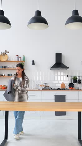 woman preparing food in a modern kitchen