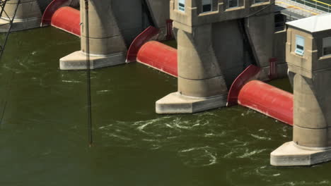 water flowing through gates of lock and dam number 4 on mississippi river near alma in wisconsin