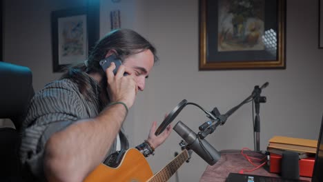 musician recording music at home