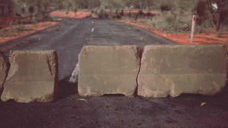 old rusted concrete road barrier blocks