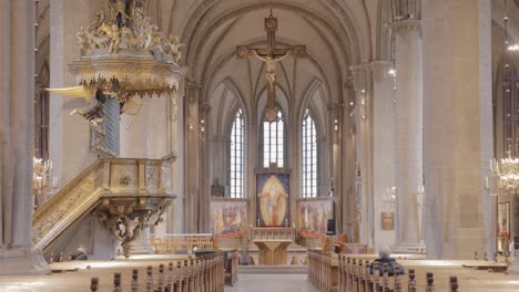 interior of linkoping cathedral with the pulpit and altar in sweden